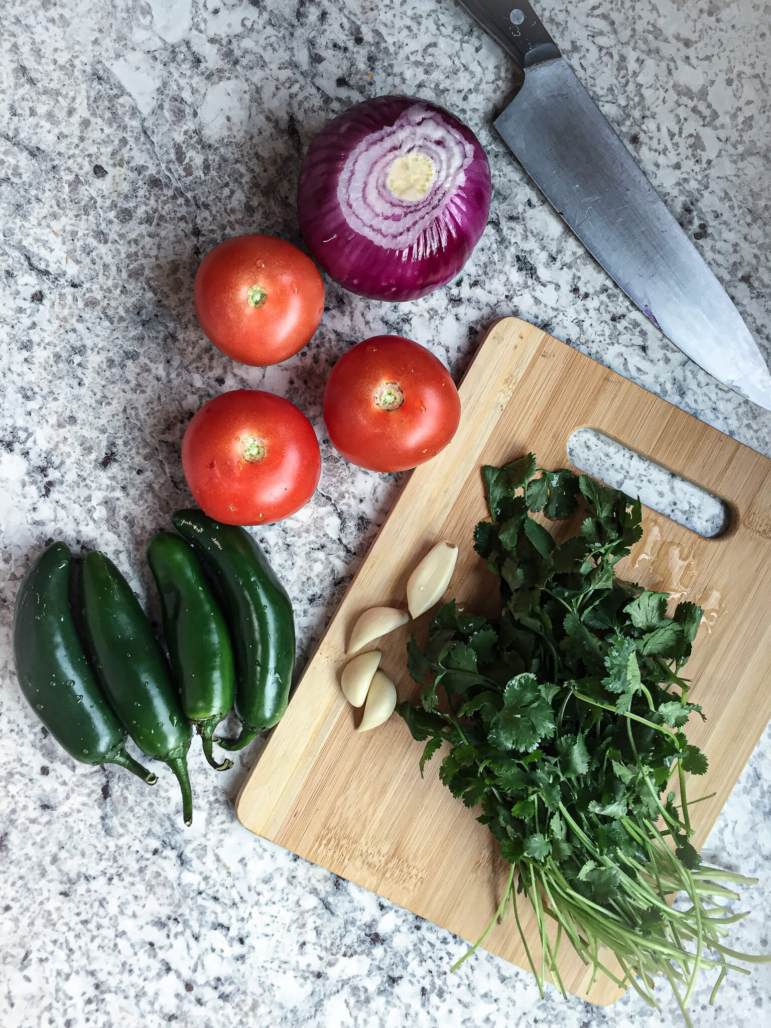 cutting board with fresh veggies