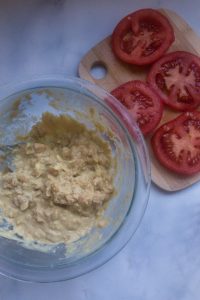 Chickpea Mash in a dish and tomatoes