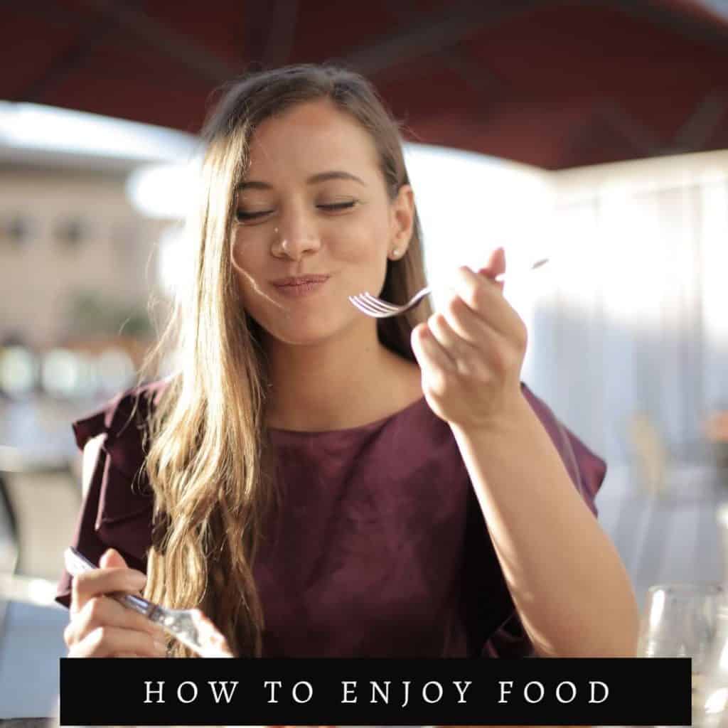 woman in red shirt eating