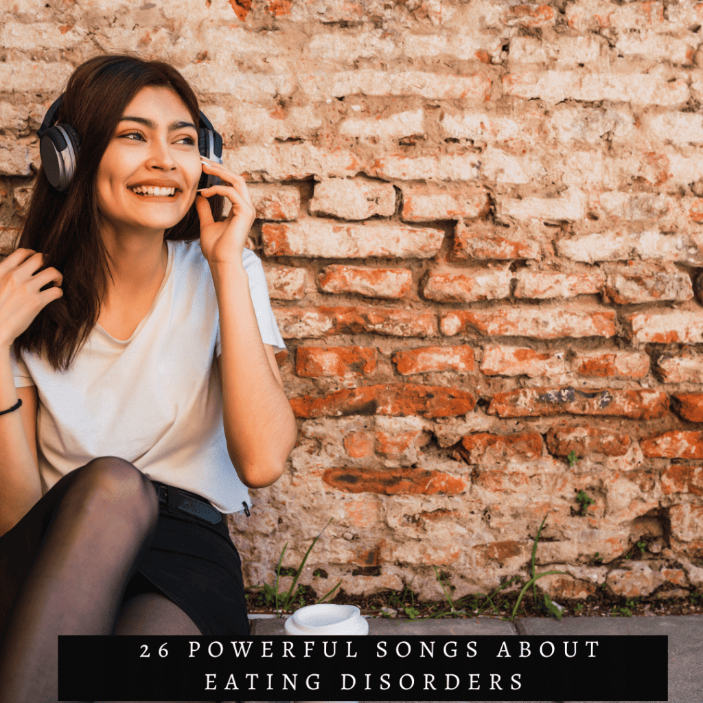 woman against brick wall with brown hair and headphones smiling