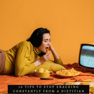 woman snacking in front of TV